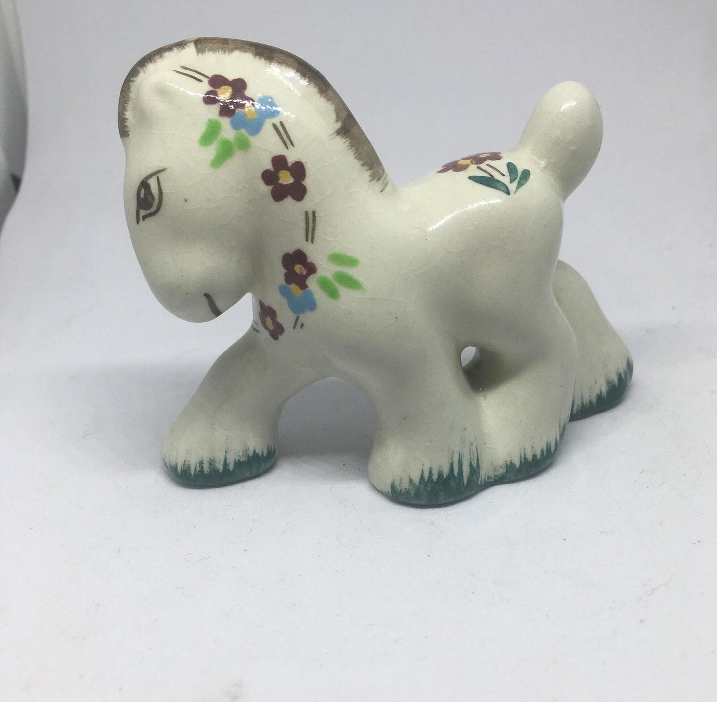 Folk art ceramic pony. Quirky hand-painted prancing ceramic pony.