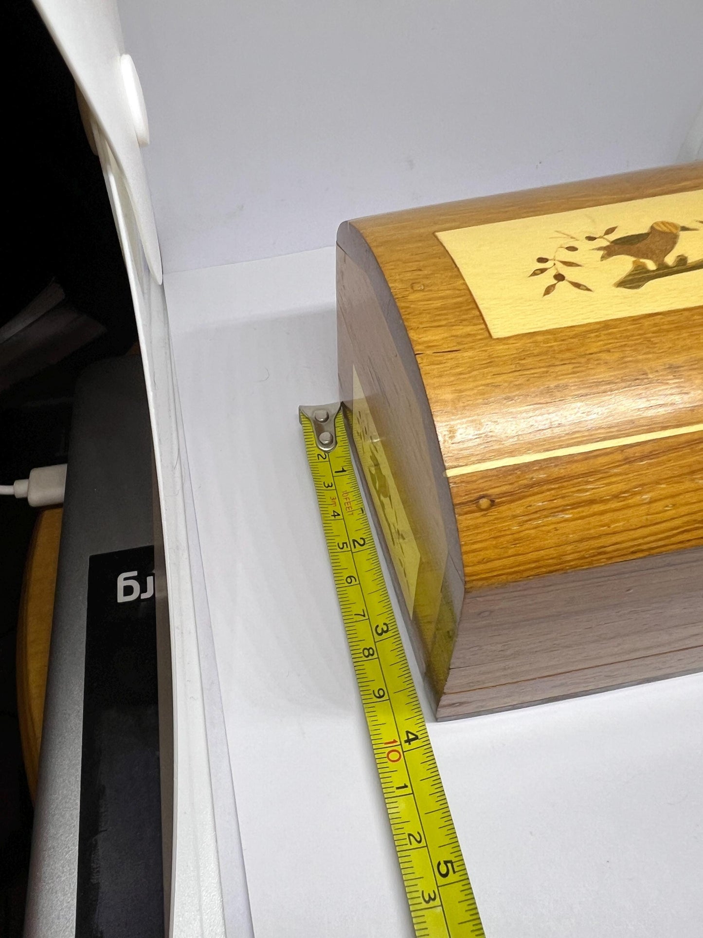 Wooden lidded secret lock treasure box. Inlaid marquetry bird themed domed jewellery box.