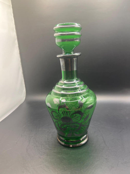 Antique Art Nouveau Emerald Green Glass Decanter with floral silver overlay and original stopper.