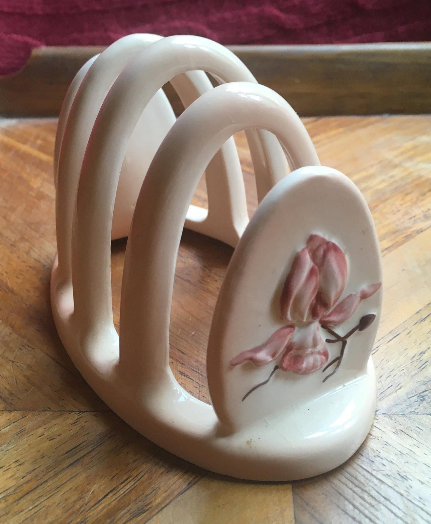 Carlton Ware pink ceramic toast rack. Pink raised flower detail. Stamped.
