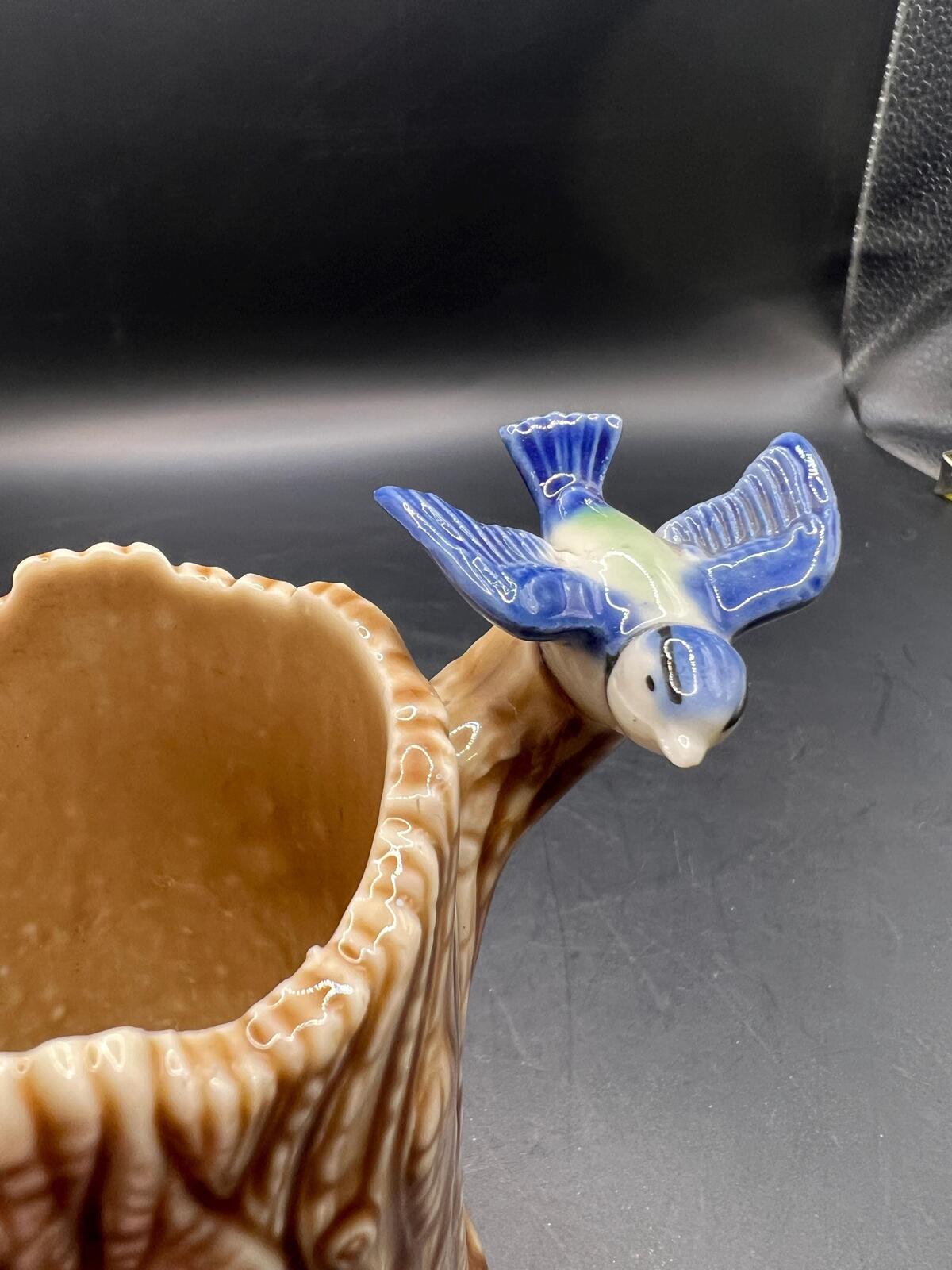 Vintage WADE posy vase. Tree stump with blue bird.