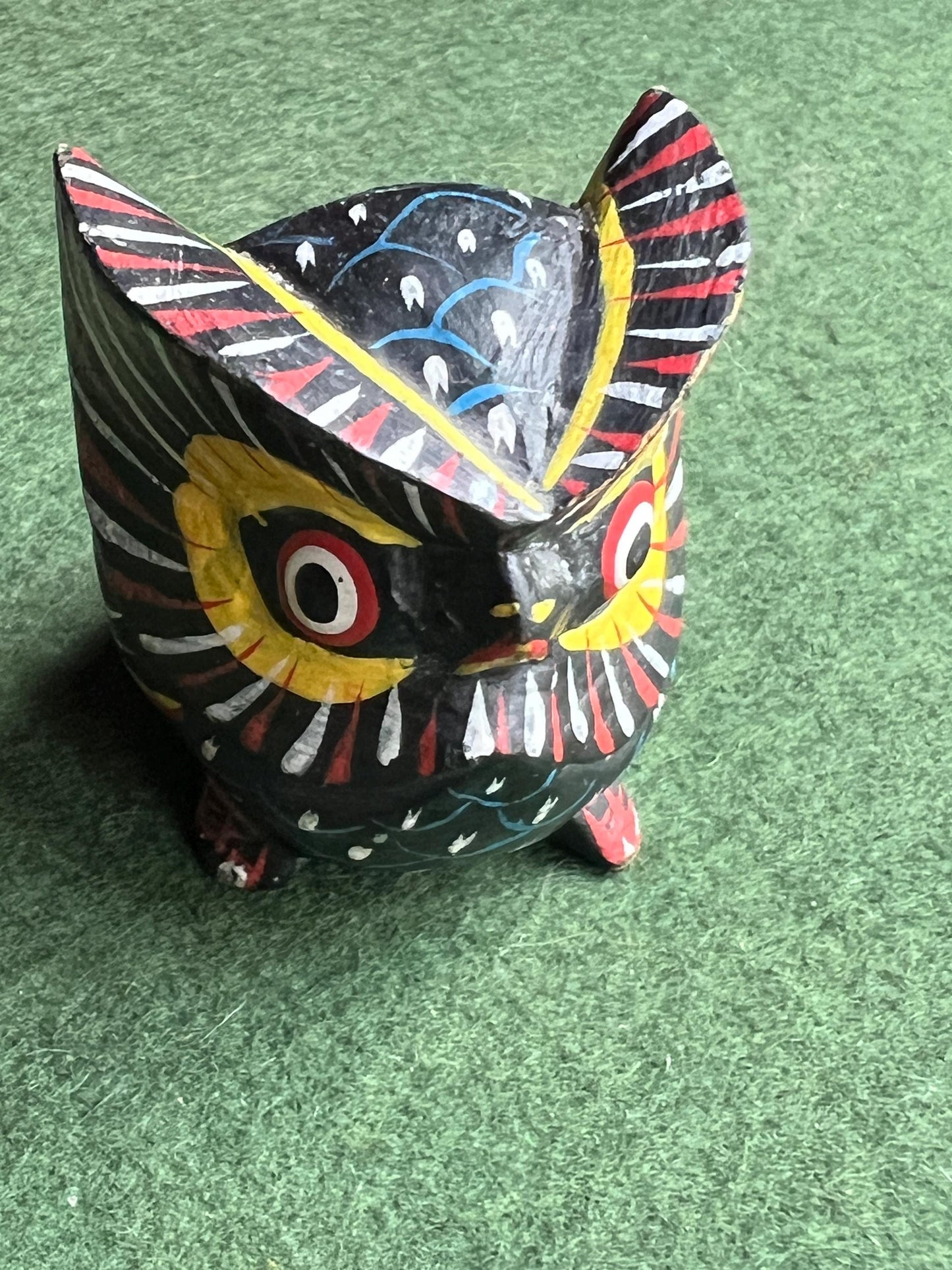 Hand painted colourful owlet ornament.