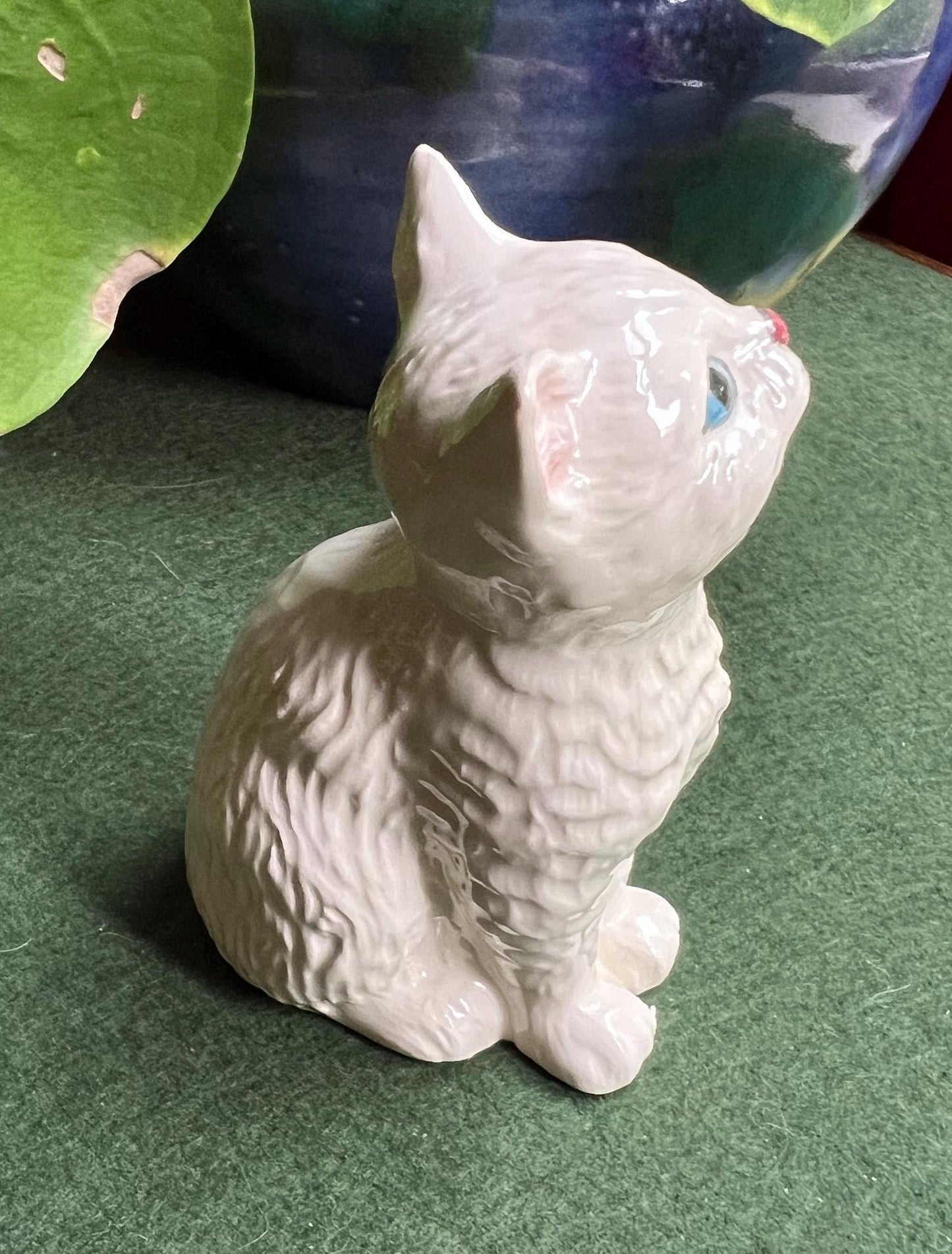 Royal Doulton Star gazing ceramic kitten.