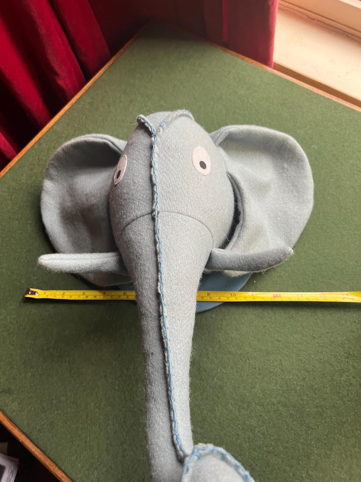 Felted elephant head wall decor for jungle nursery theme. Child's bedroom animal textile wall art.