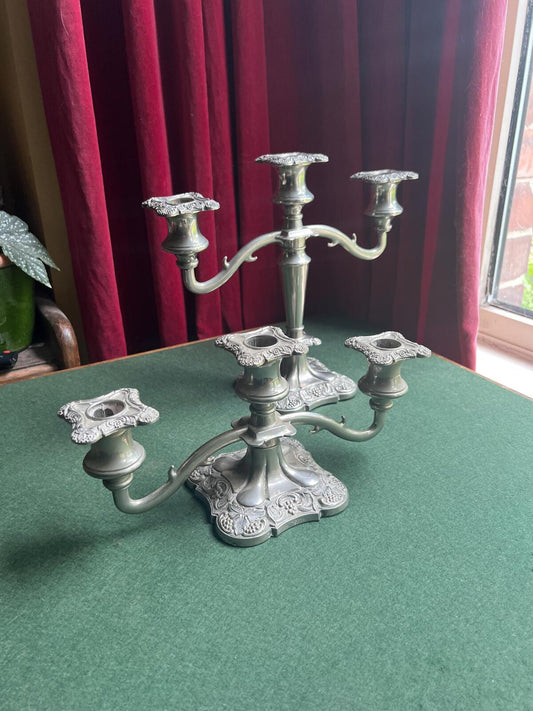 Pair of Vintage antique candlestick holders. Grape and vine pattern silver plated 3 arm candle holders. Mismatched heights.