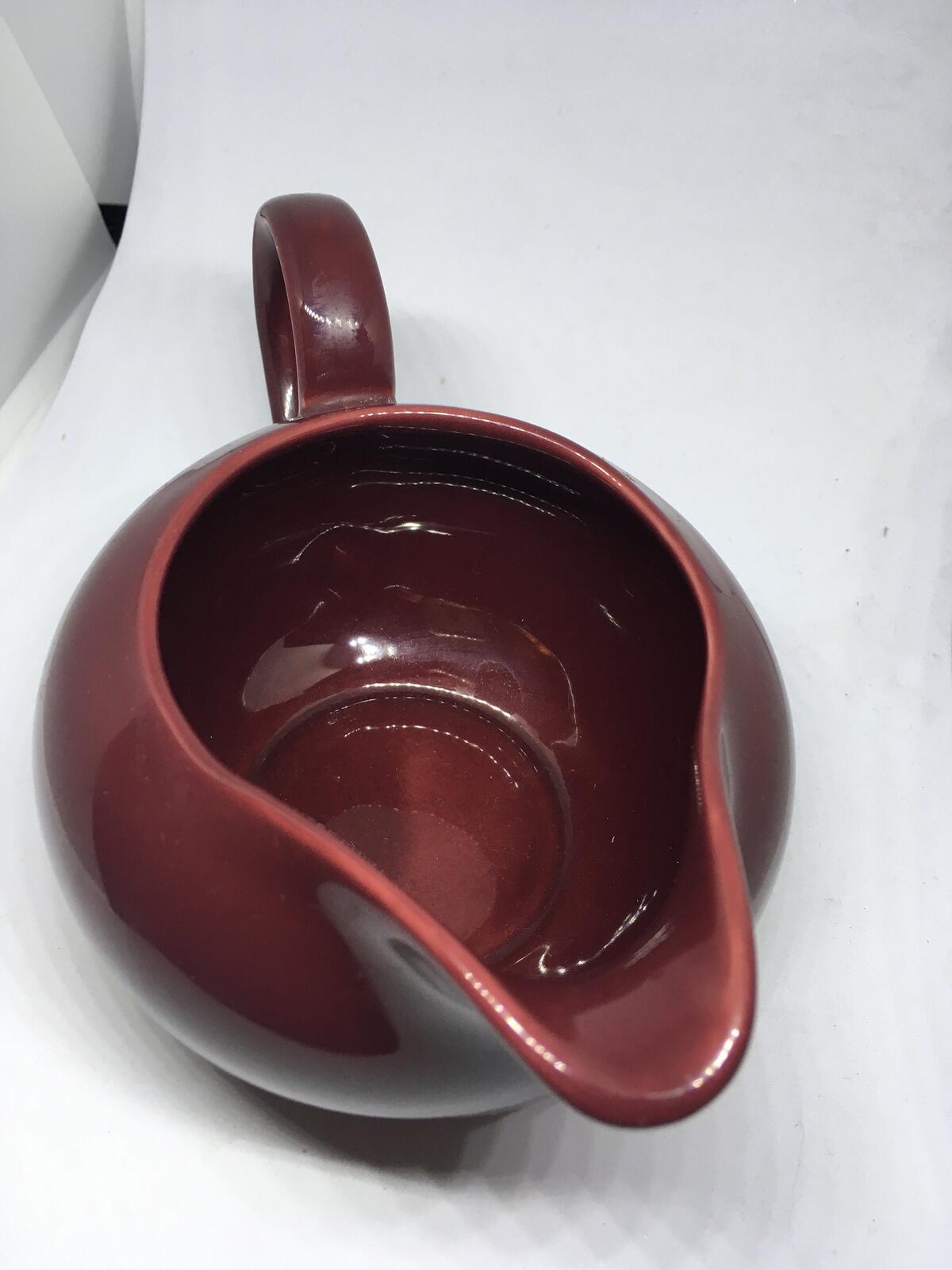 Vintage deep red Poole Pottery milk jug creamer sauce boat.