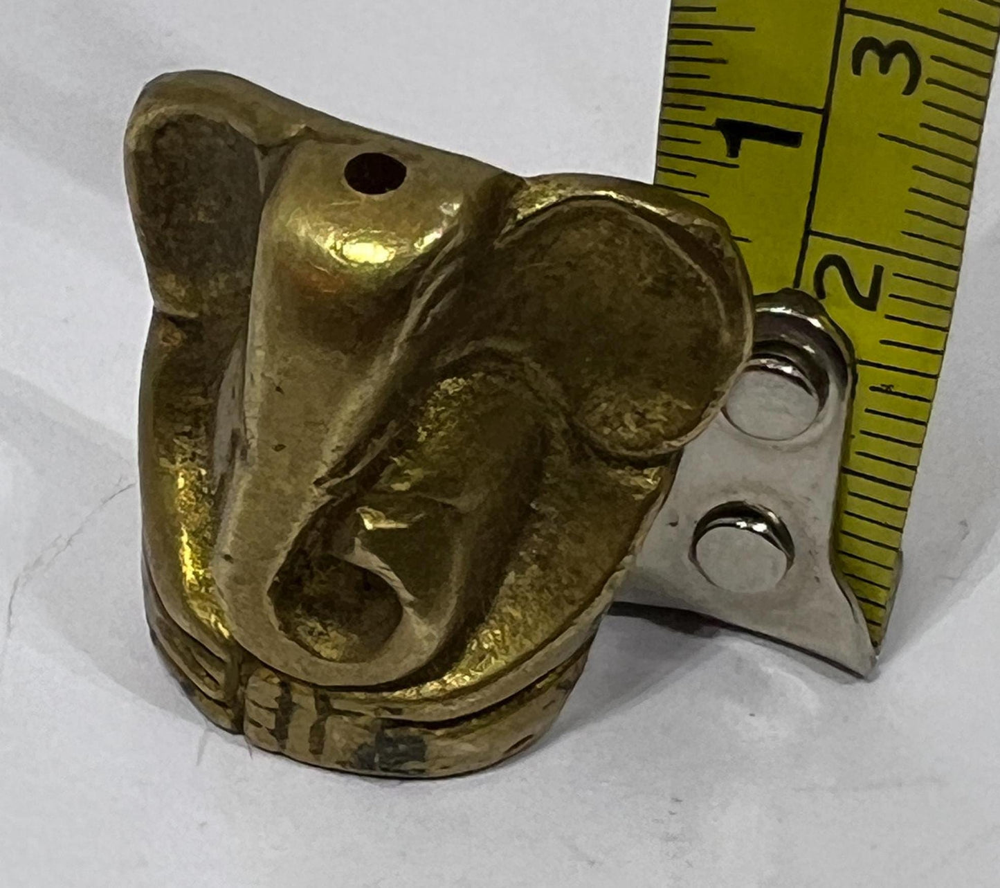 Tiny solid brass Ganesh elephant incense stick holder.