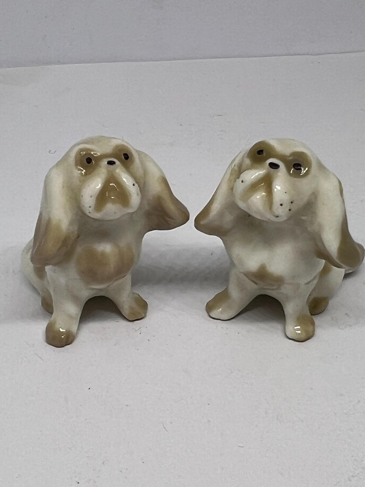Pair of miniature Pekinese or Bolognese dogs. Hand painted Porcelain Lomonosov USSR dog figurines.