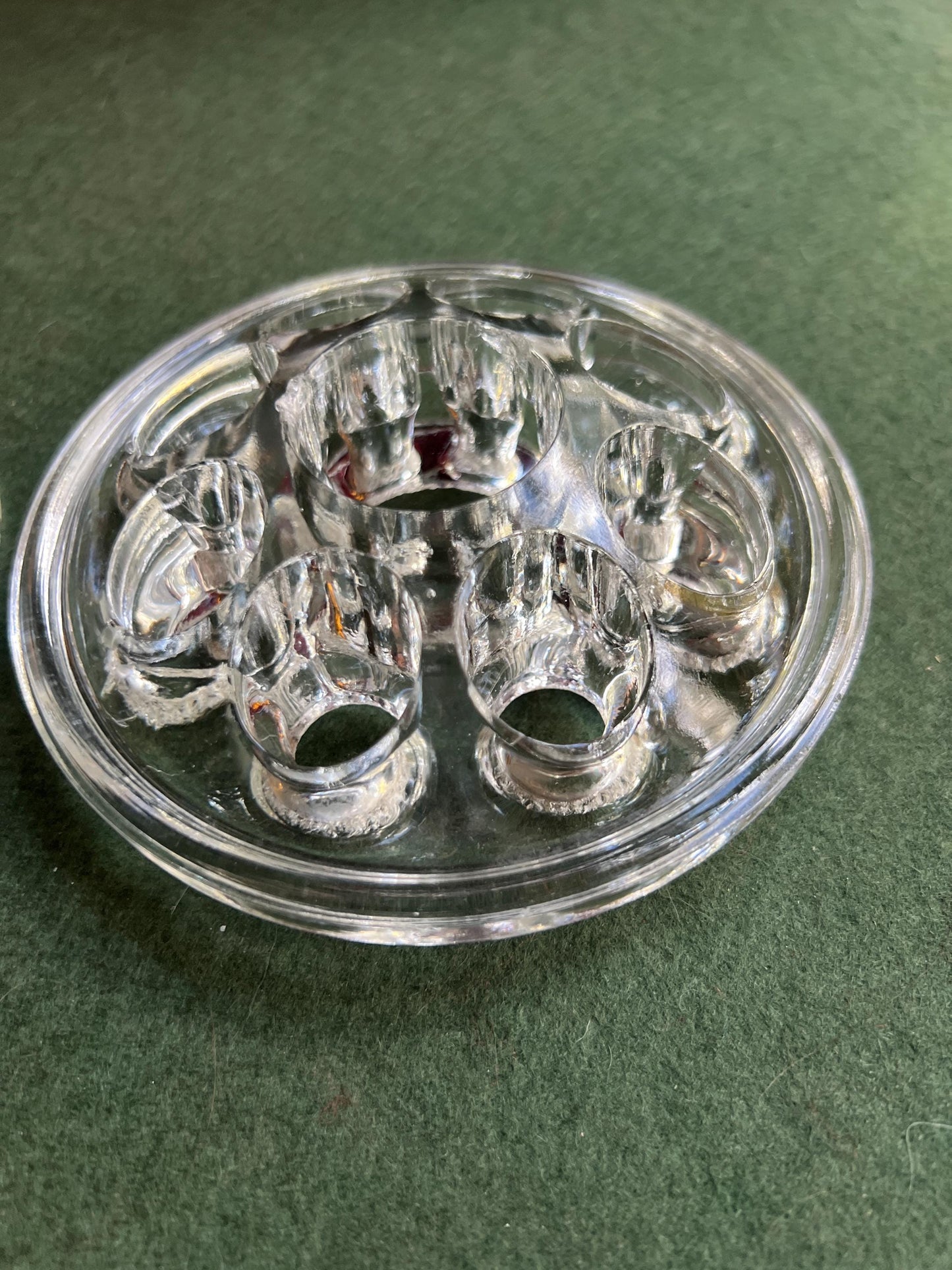 Vintage clear glass flower frogs. 2 available Sold separately.
