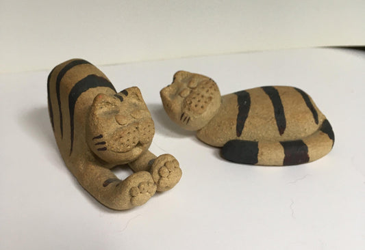 Cat figurines.