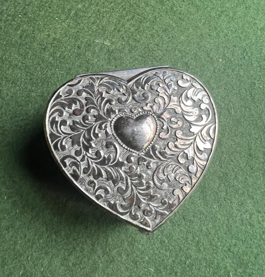 Vintage silver plated heart shaped trinket box. Red velour lined lidded decorative jewellery box.