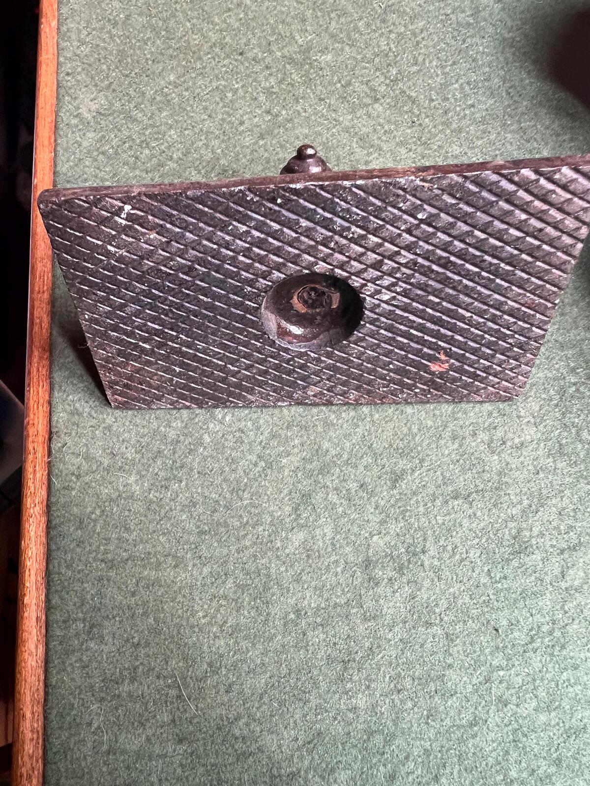 Ornate antique cast iron paperweight. Handled Victorian paperweight doorstop. Decorative pyramid swirl patterned quirky paperweight.