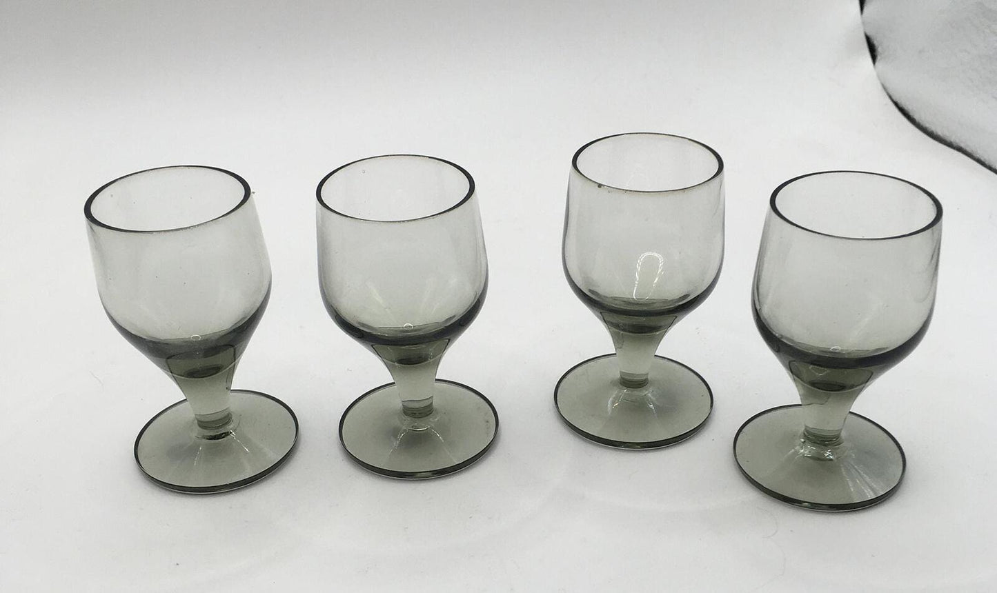 Set of 4 smoky grey sherry port glasses. Mid Century Modern Bar ware.