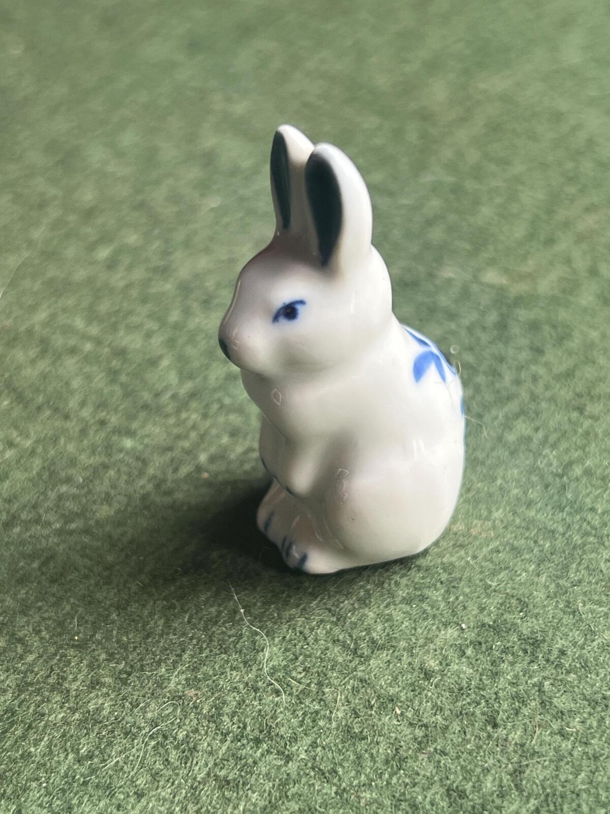 Miniature ceramic bunny figurine. Blue white delft style hand painted rabbit.