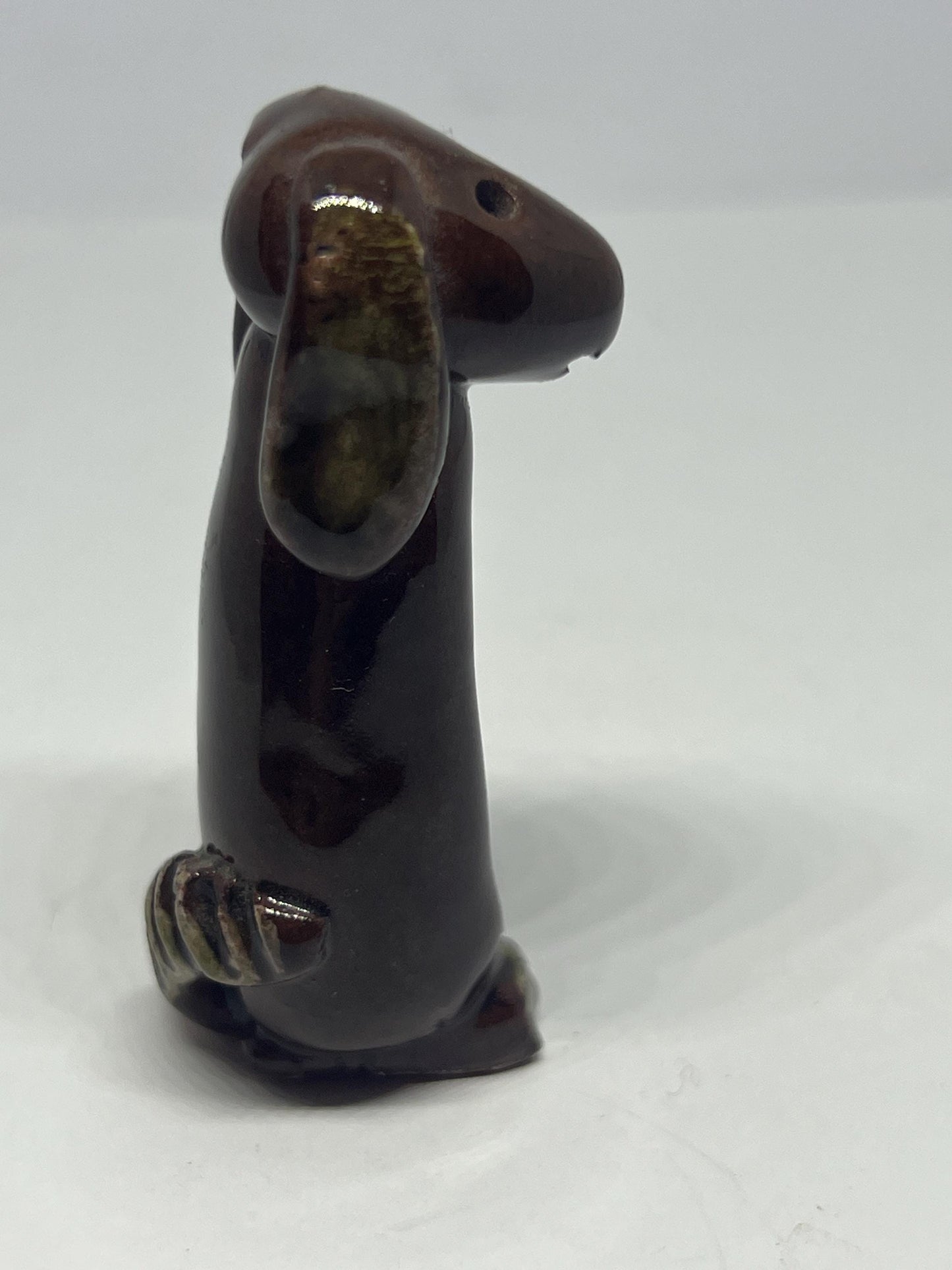 Tiny studio pottery dog figurine.