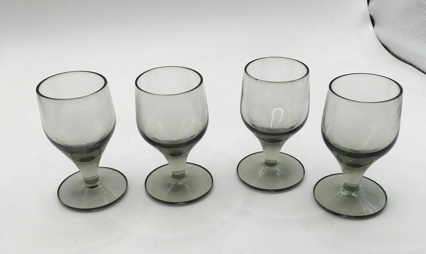 Set of 4 smoky grey sherry port glasses. Mid Century Modern Bar ware.
