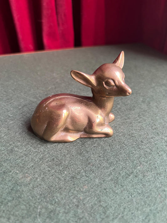 Vintage brass deer figurine. Resting fawn brass paperweight.
