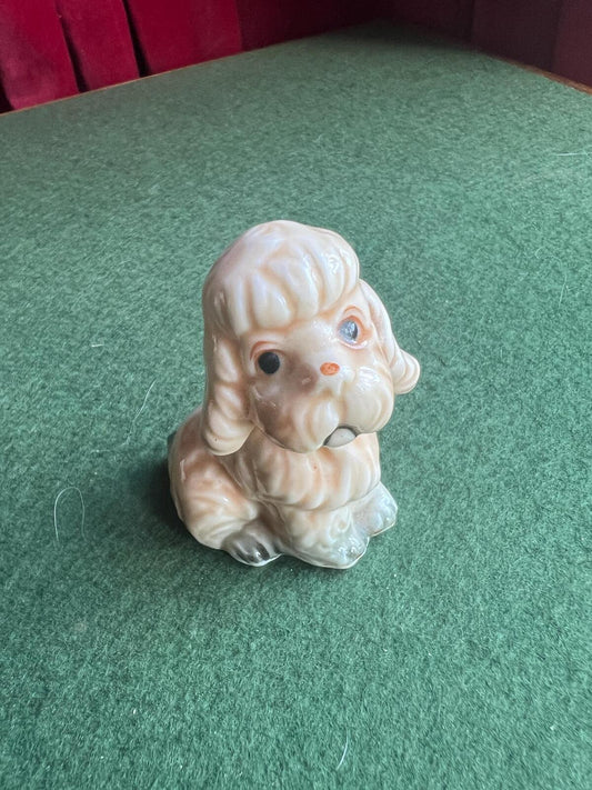 Vintage sad poodle puppy figurine. Bone China Dog ornament. Original sticker.