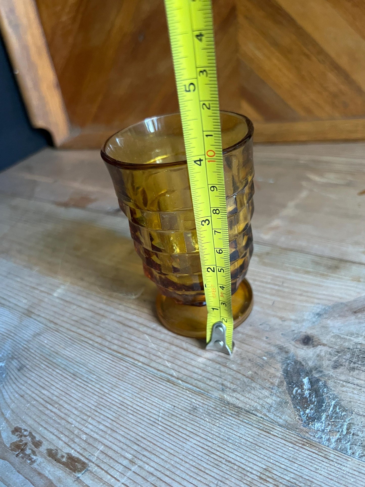 Vintage footed tumbler. Indiana Whitehall Amber glass cubist design drink ware.