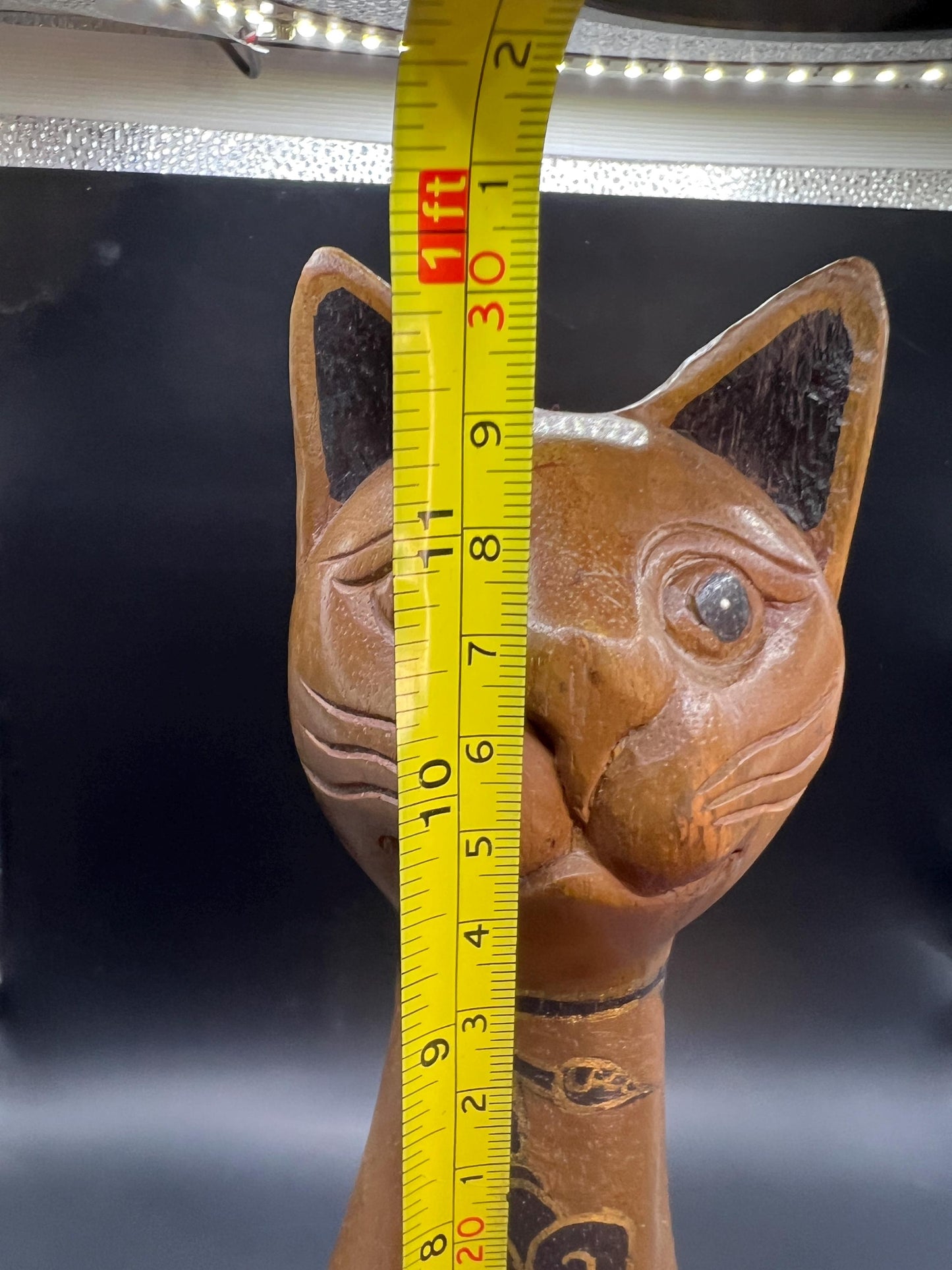 Hand carved wooden cat figurine. Made in Thailand.