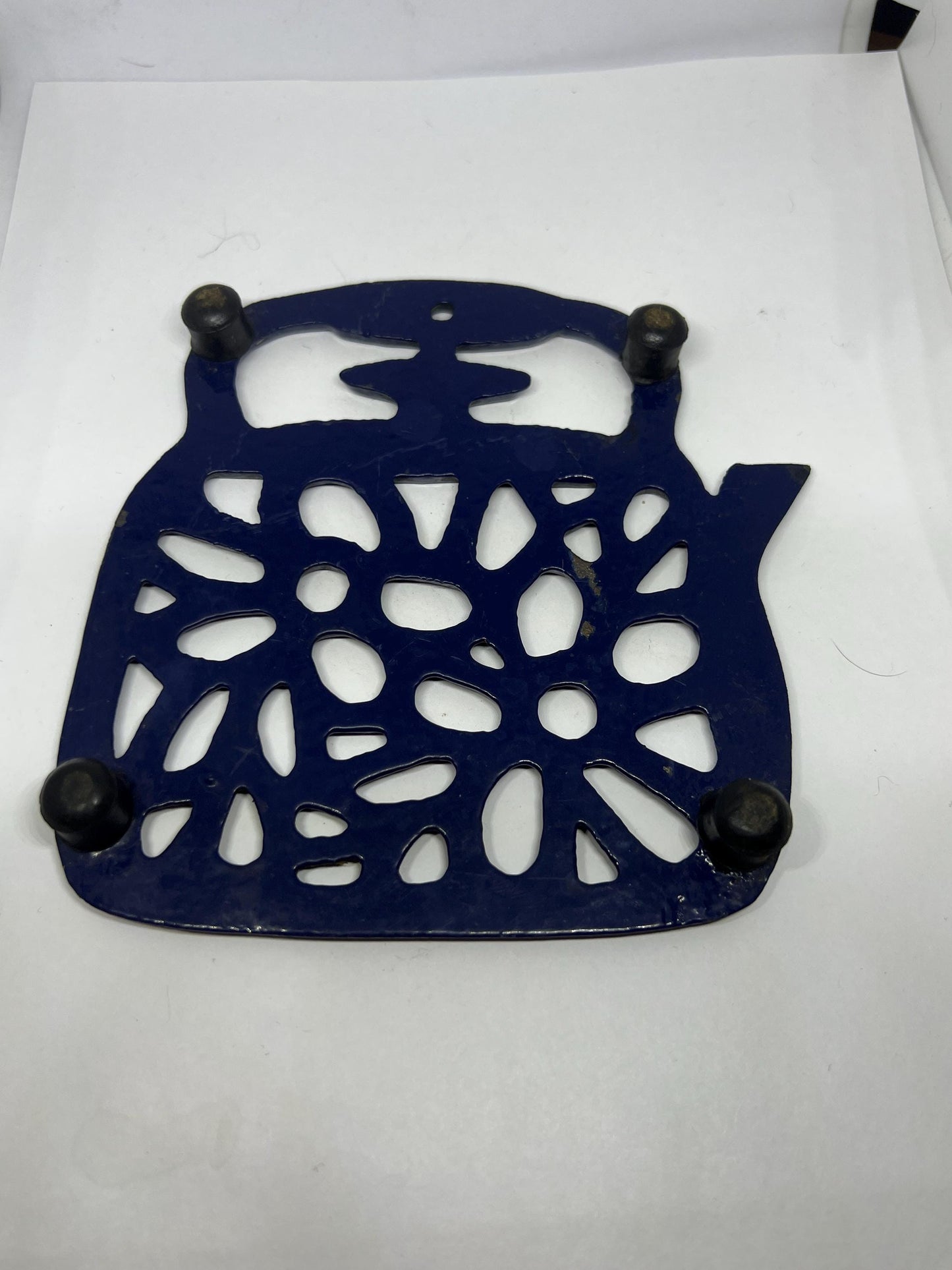 Vintage cast iron Trivet. Blue kettle teapot shaped 4 footed kitchen worktop saver trivet.