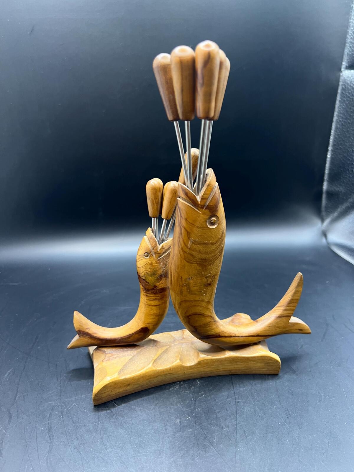 Wooden olive serving set. MCM carved olive wood fish design with 6 forks and 4 picks.