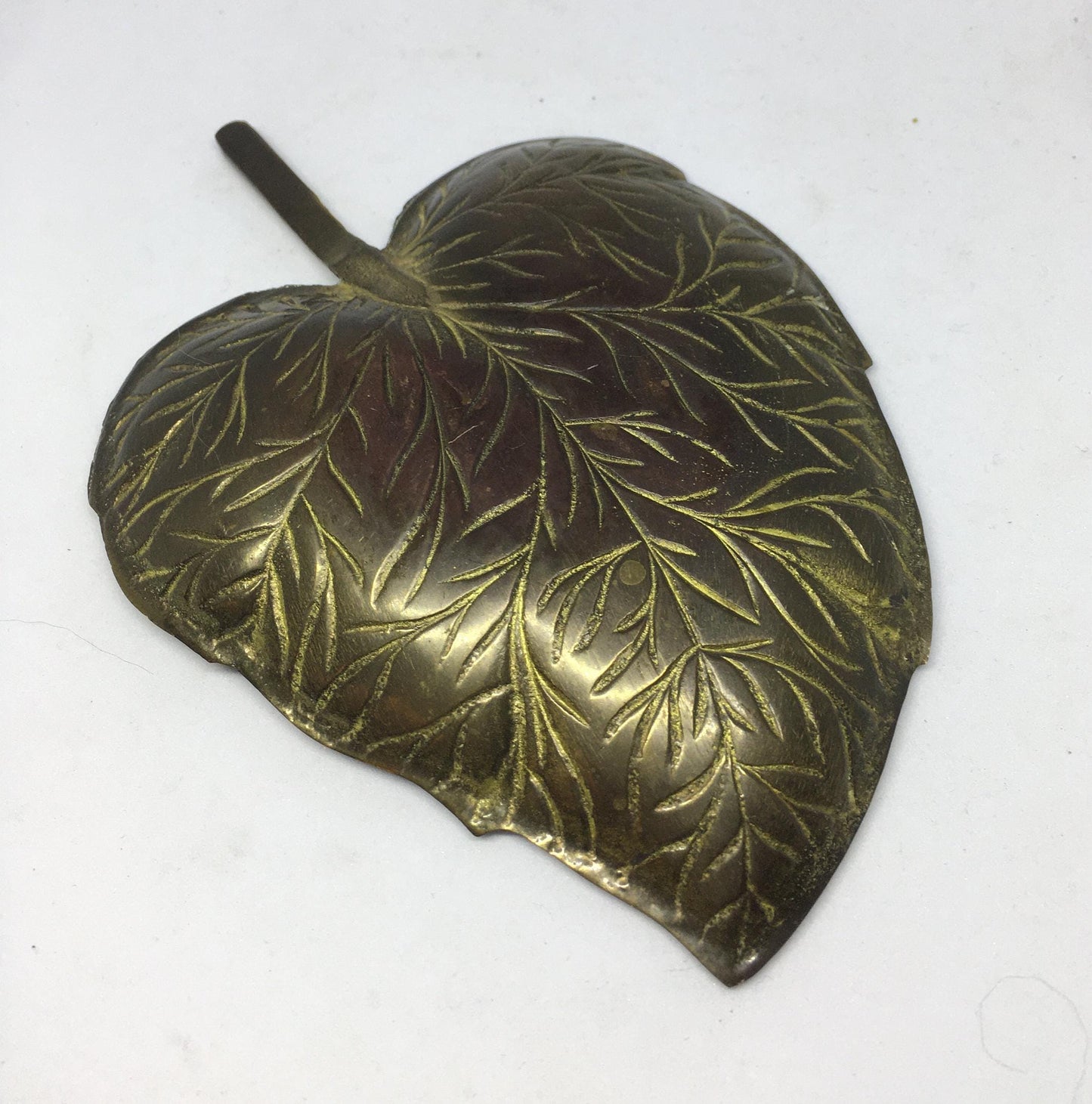 Decorative brass leaf trinket key dish.