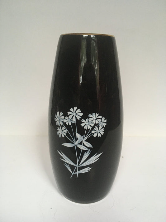 Vintage black glass bud vase. Marked WADE England.