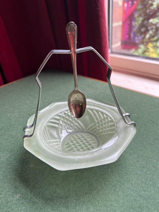 Vintage green pressed glass jam sugar bowl with metal handle spoon hanger. Stamped W+H.