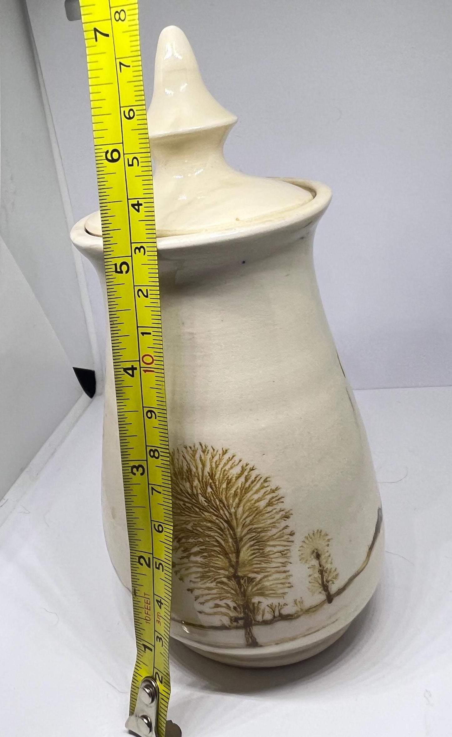 Mocha ware lidded pot Cream glaze with tree design detail in the style of Vanessa Waller.