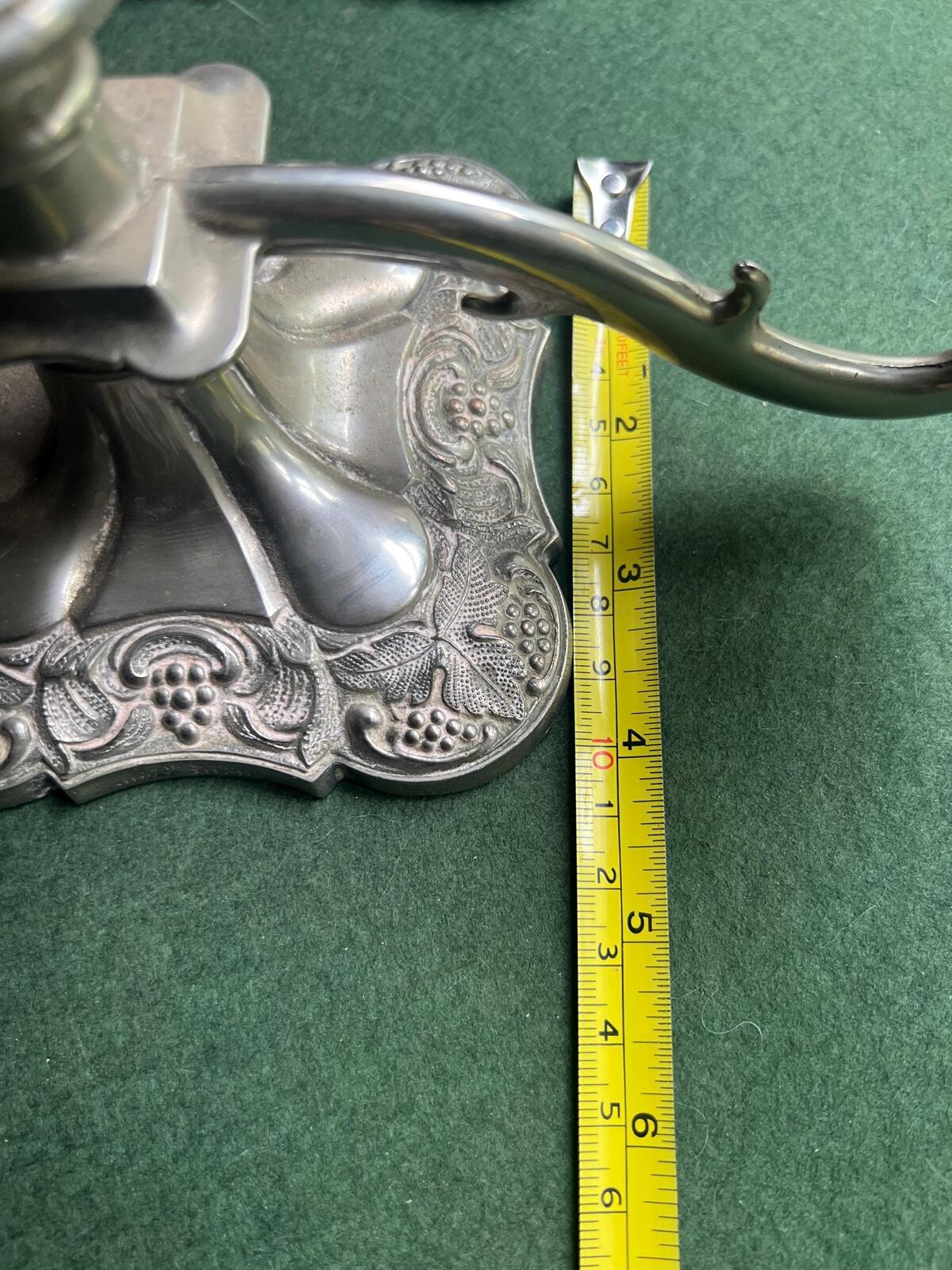 Pair of Vintage antique candlestick holders. Grape and vine pattern silver plated 3 arm candle holders. Mismatched heights.