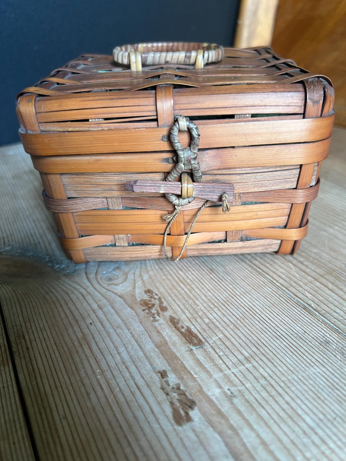 Vintage bamboo hand woven sewing basket. Green satin lined small lidded sewing basket.