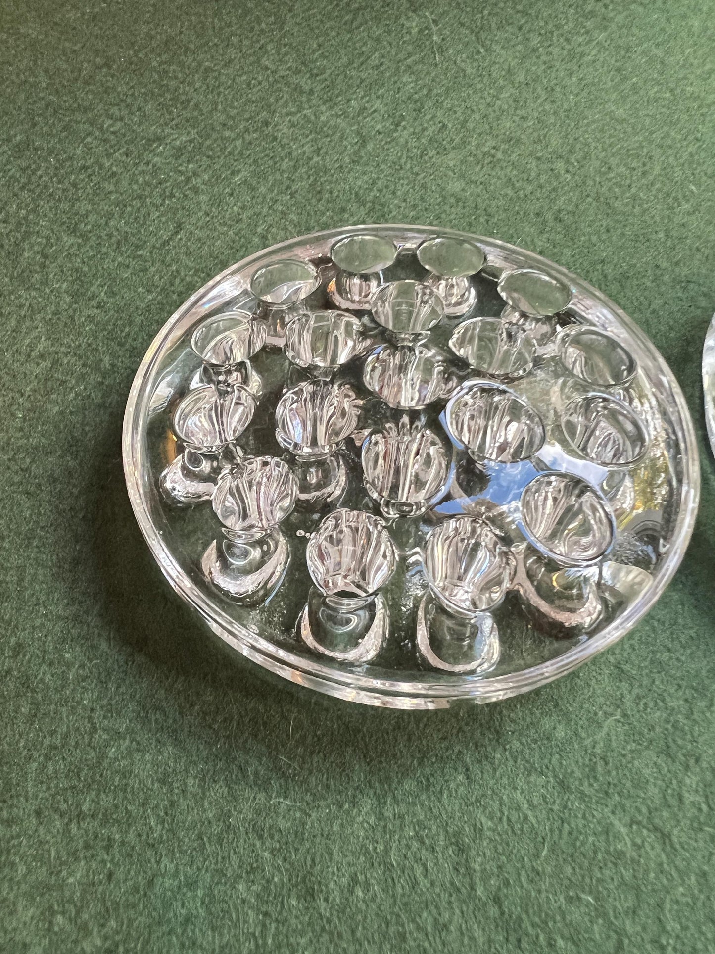 Vintage clear glass flower frogs. 2 available Sold separately.