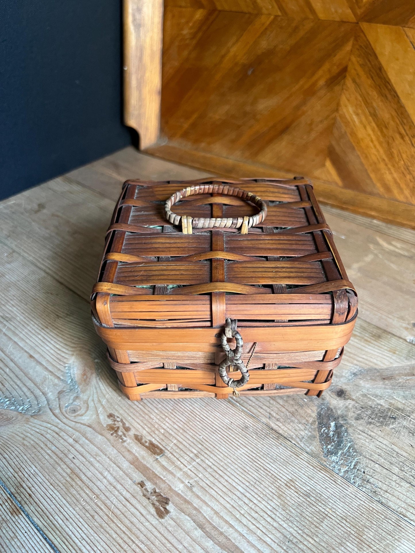 Vintage bamboo hand woven sewing basket. Green satin lined small lidded sewing basket.