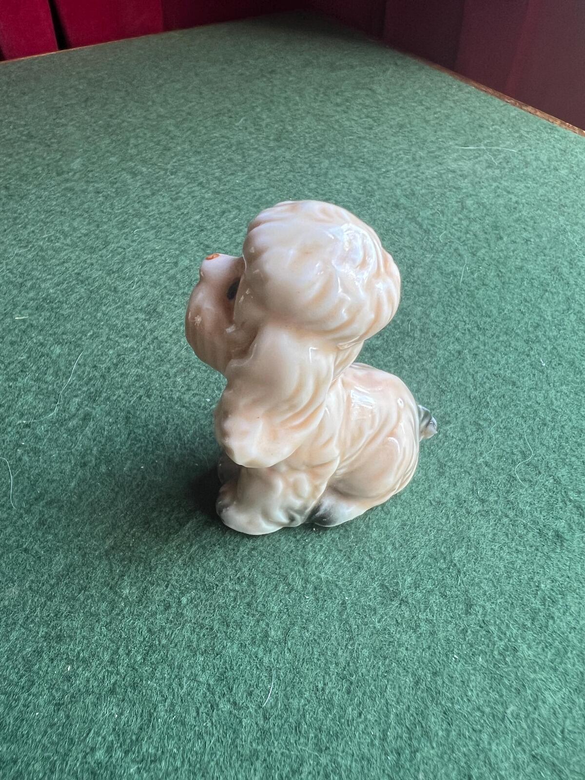 Vintage sad poodle puppy figurine. Bone China Dog ornament. Original sticker.