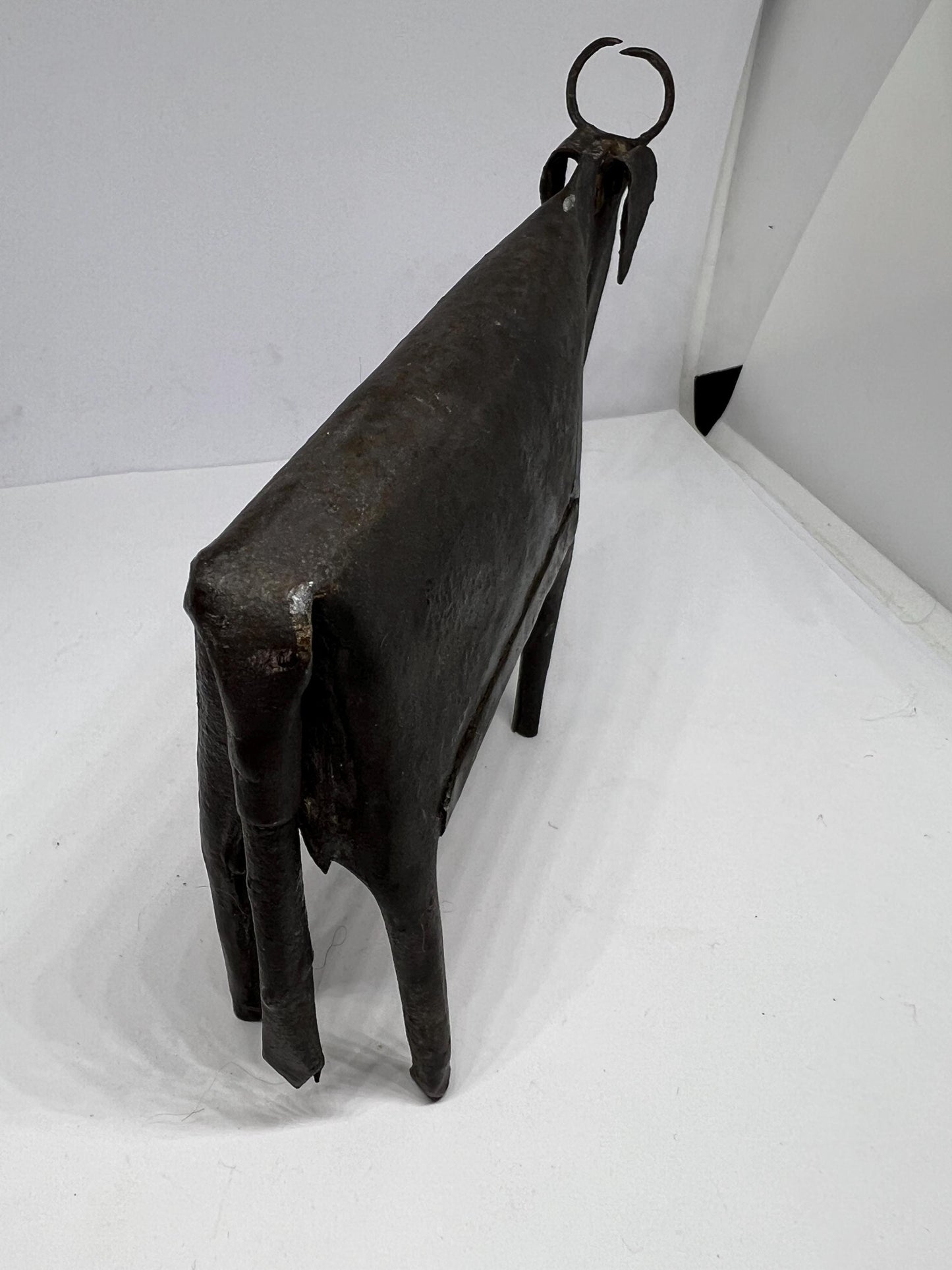 Brutalist metal cow sculpture.  Iron abstract folk art figurine.