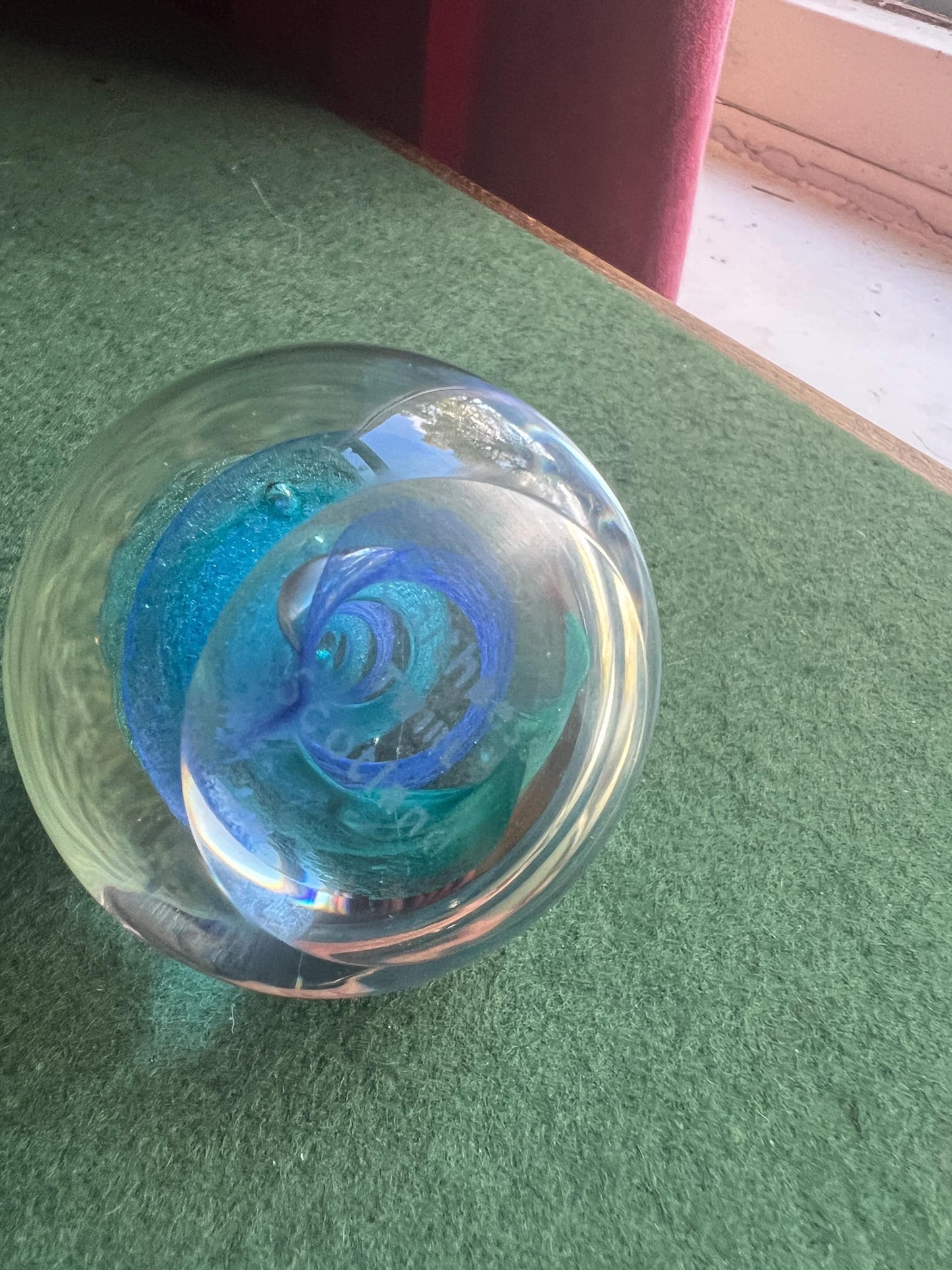 Vintage paperweight. Blue swirl in clear glass. Stamped Twirl Caithness Scotland.