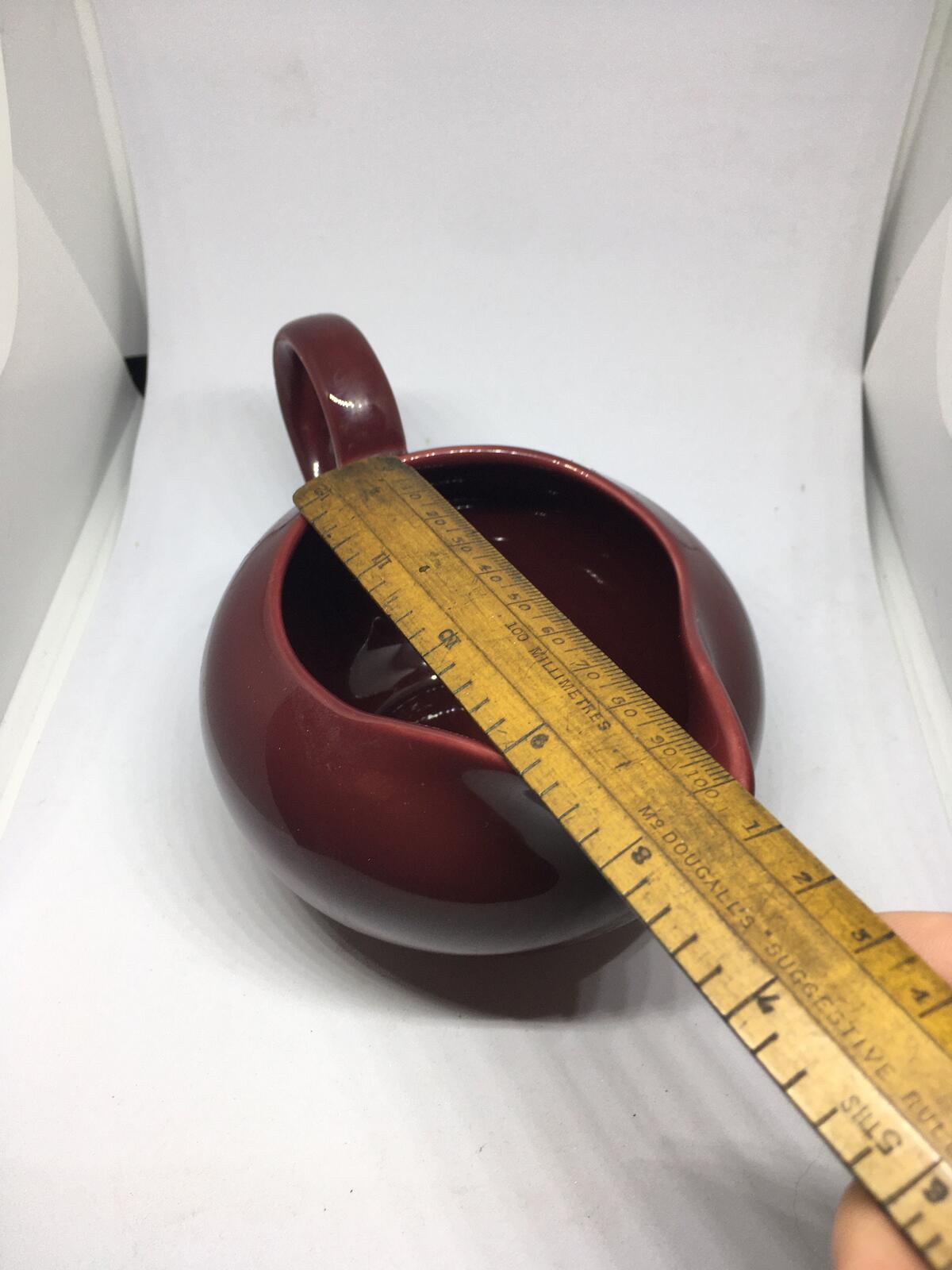 Vintage deep red Poole Pottery milk jug creamer sauce boat.