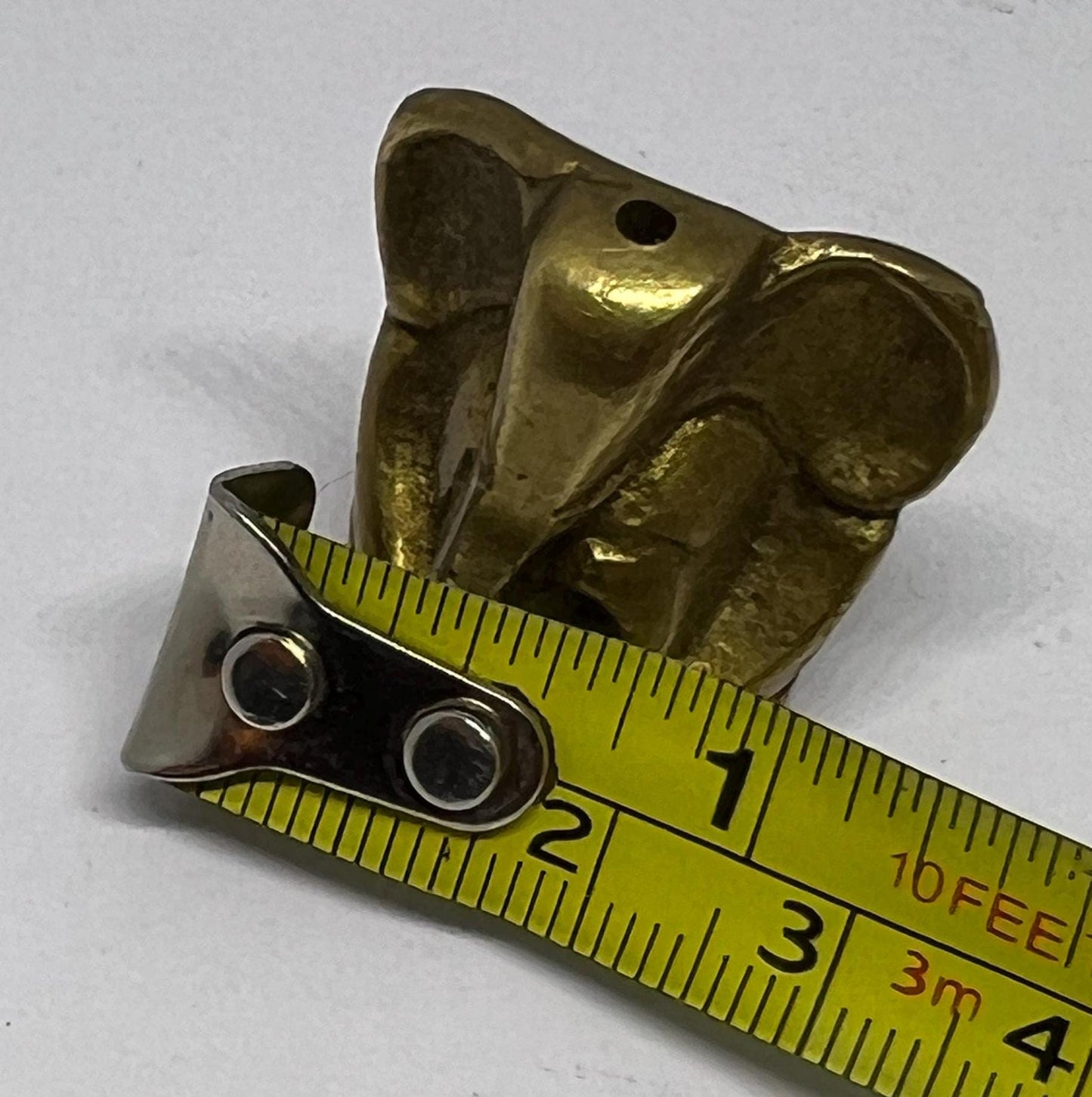 Tiny solid brass Ganesh elephant incense stick holder.