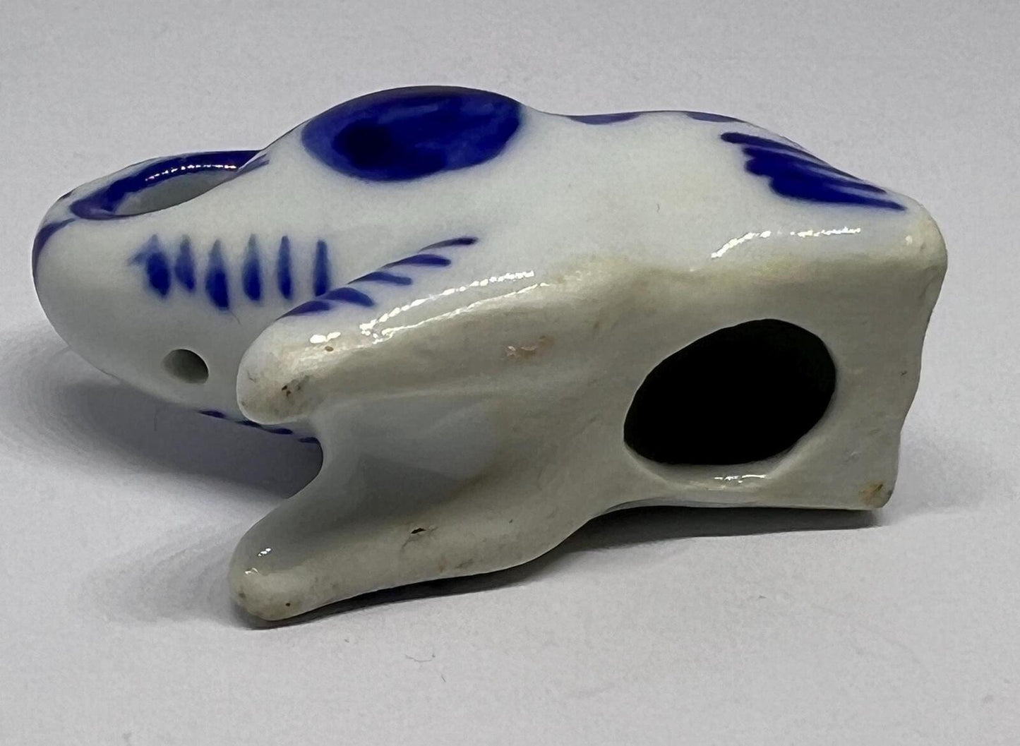Lucky trunk up sitting elephant ornament. Blue white vintage elephant.