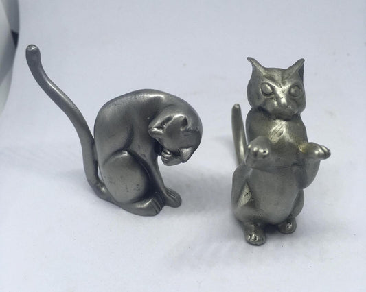 Two pewter cats one sitting up boxing, marked Selangor Pewter  7703.