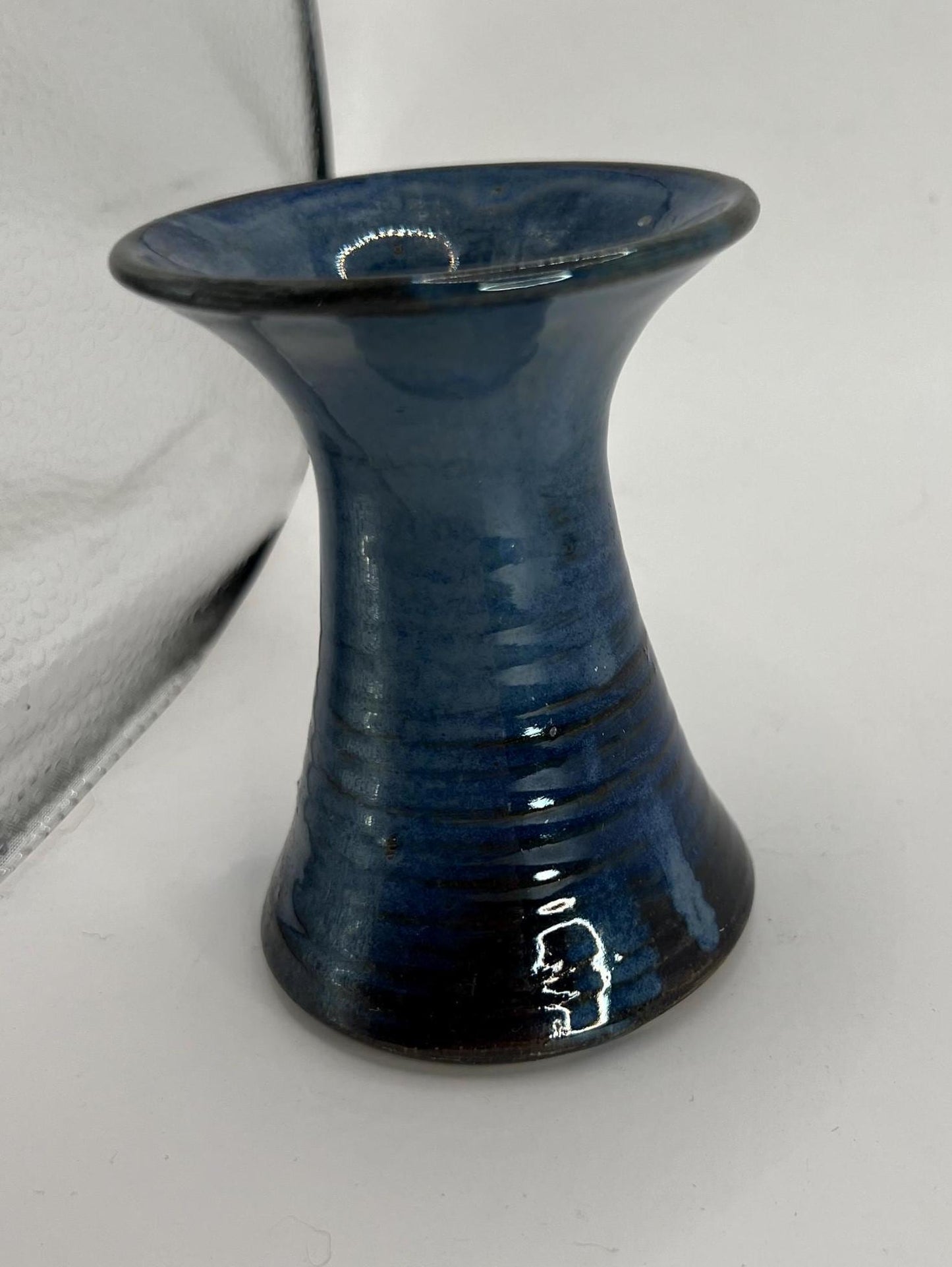 Blue black glaze trumpet vase. Marked 'aino'.