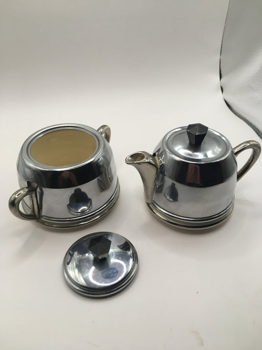 Vintage ceramic and metal insulated creamer and covered sugar bowl.