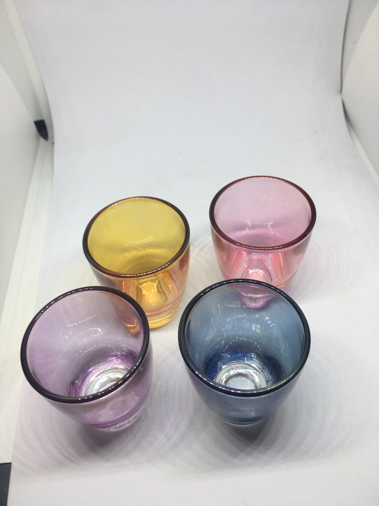 1950s Harlequin glass 6 shot glasses in wire holder.