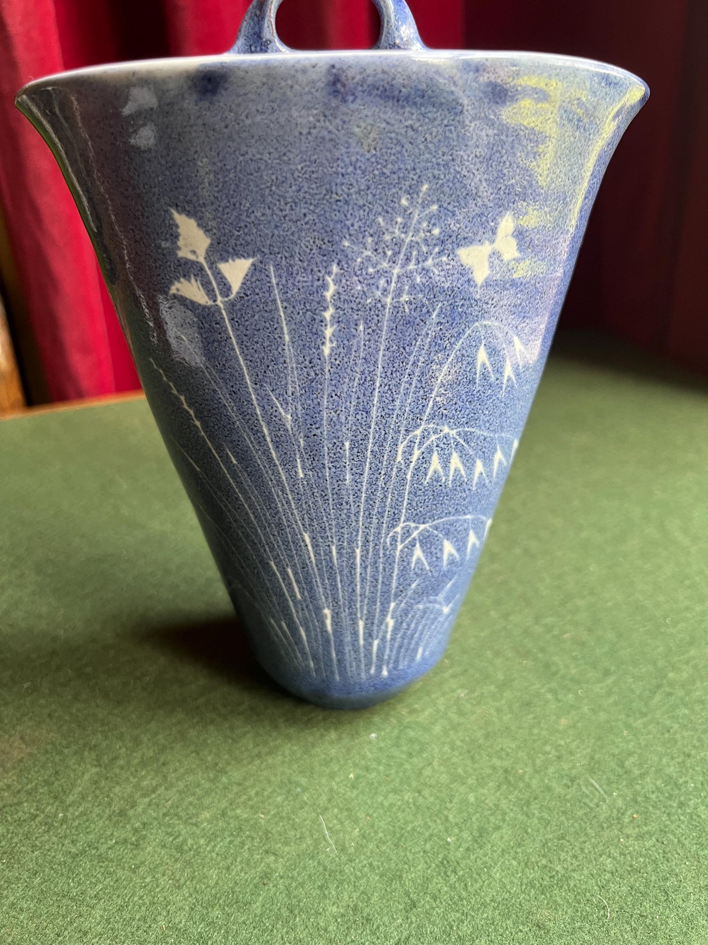 Studio pottery wall pocket. Blue glaze posy vase floral butterfly decor.
