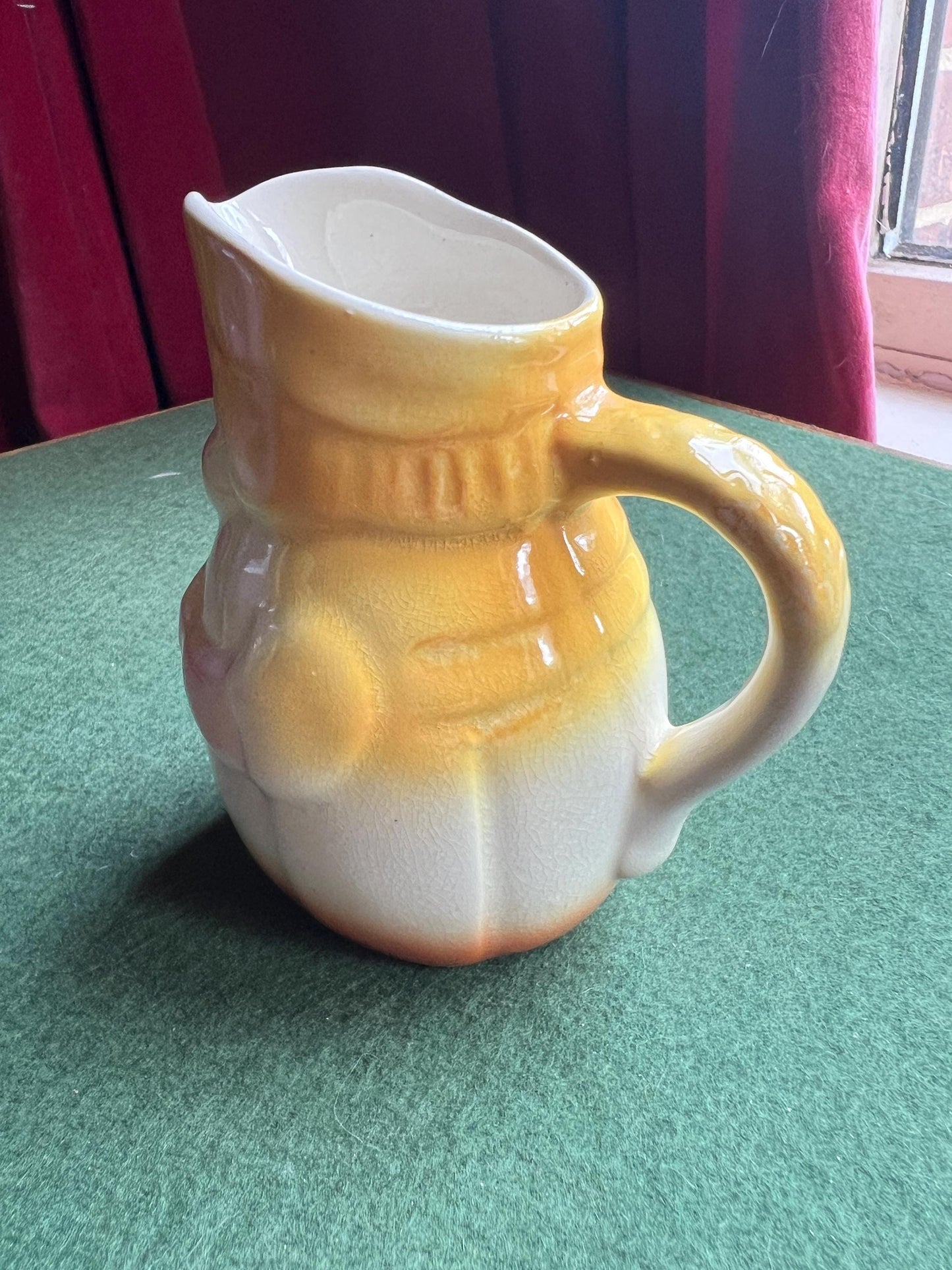 Erphila Czechoslovakia hand painted lady holding flowers vase milk jug.