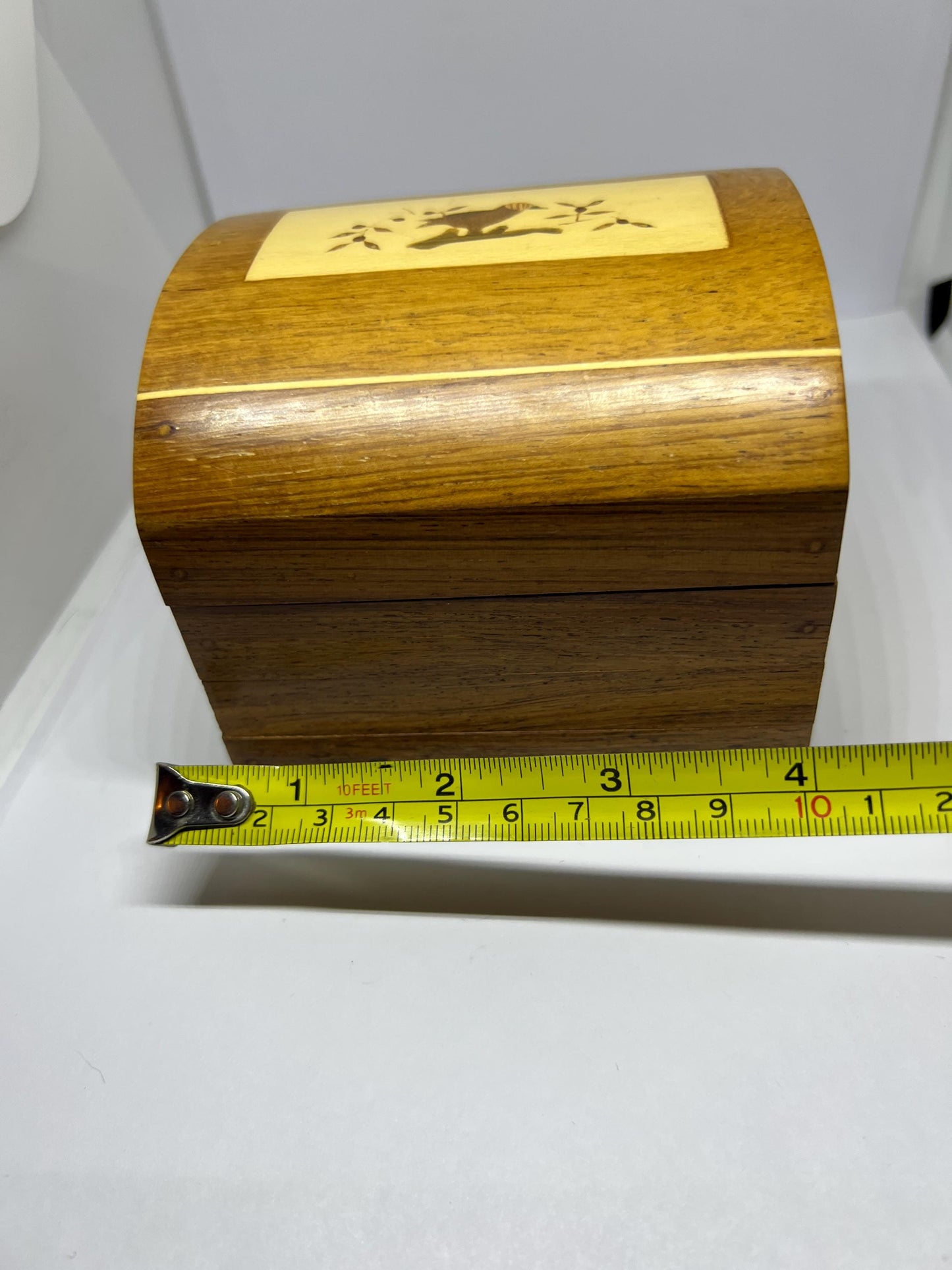 Wooden lidded secret lock treasure box. Inlaid marquetry bird themed domed jewellery box.