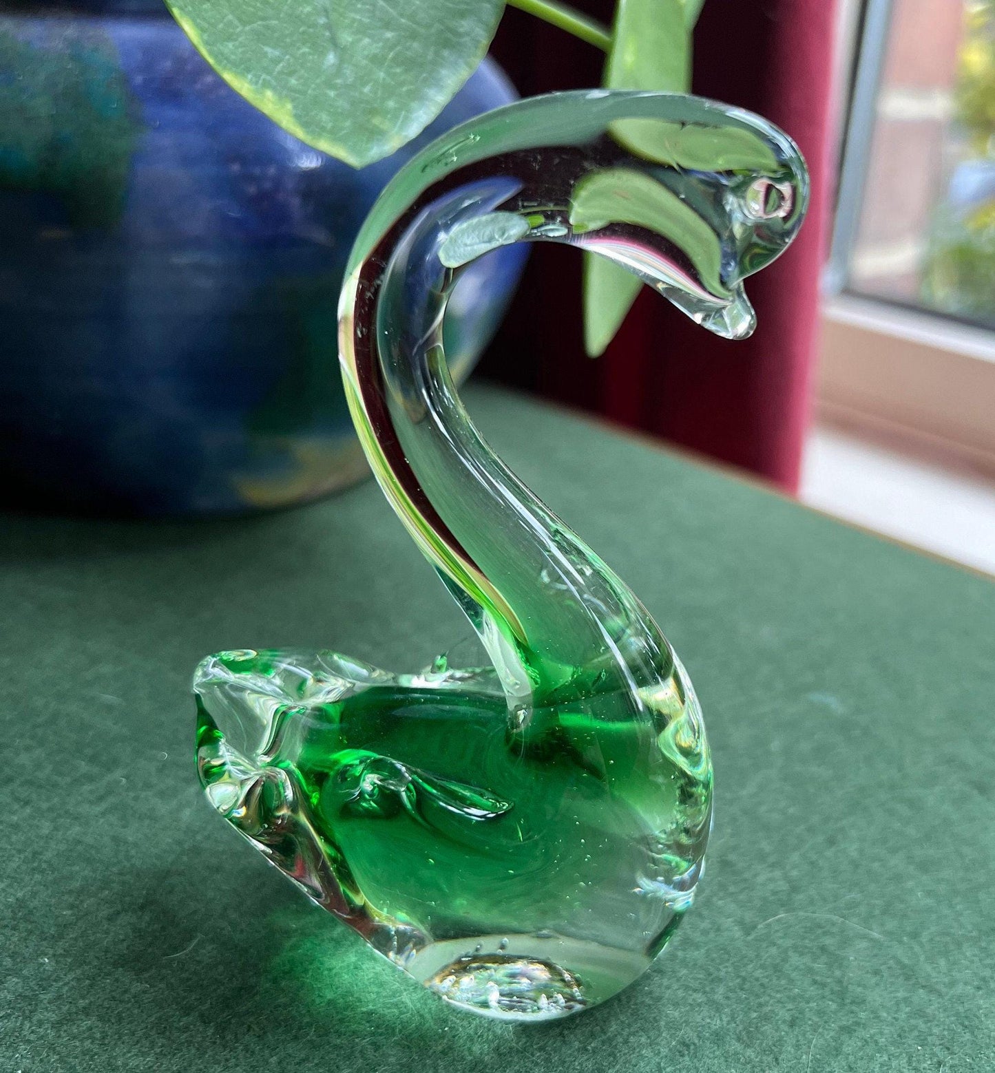 Beautiful hand blown green glass swan figurine.