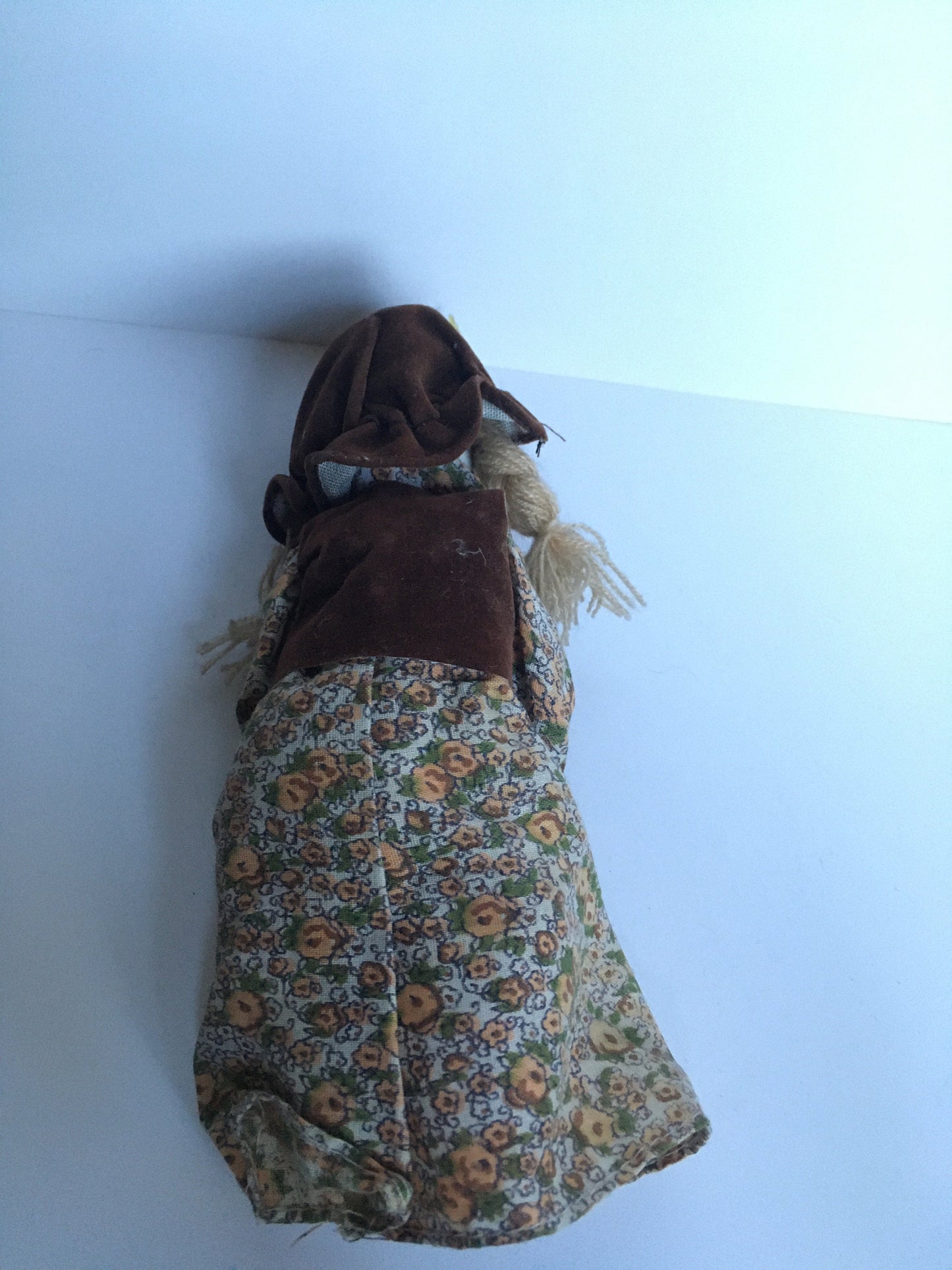 1970s ceramic doll in original clothes.