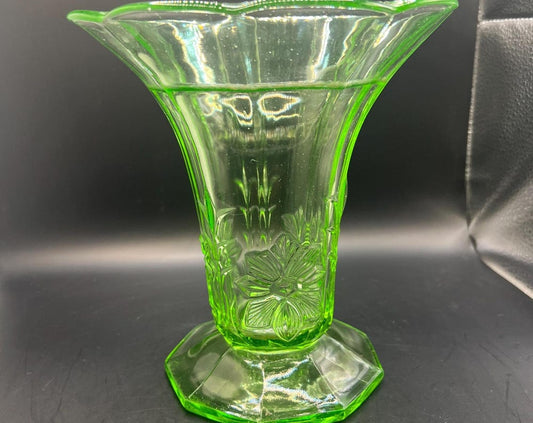 Vintage antique uranium glass vase. Octagonal base with flared ruffle rim and floral imprint.